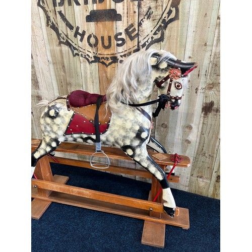 351 - Antique child's rocking horse. [113x140cm]