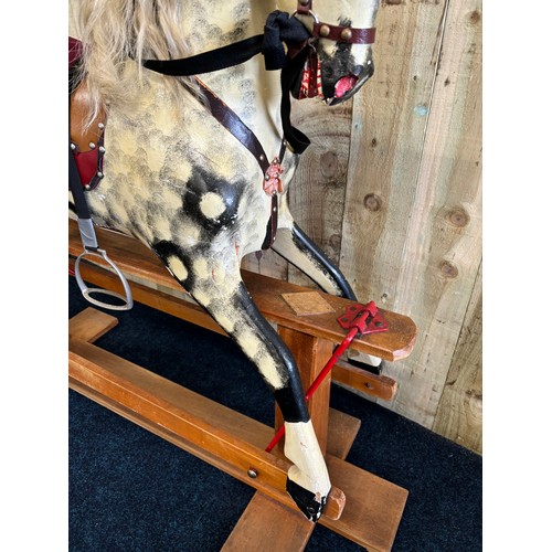 351 - Antique child's rocking horse. [113x140cm]