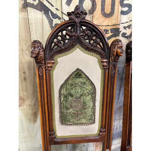 341 - A Pair of Gothic style fruit wood chairs with original tapestry panels. These solid Victorian chairs... 