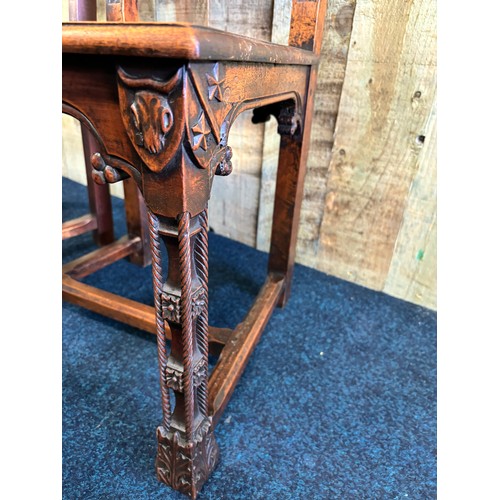 341 - A Pair of Gothic style fruit wood chairs with original tapestry panels. These solid Victorian chairs... 