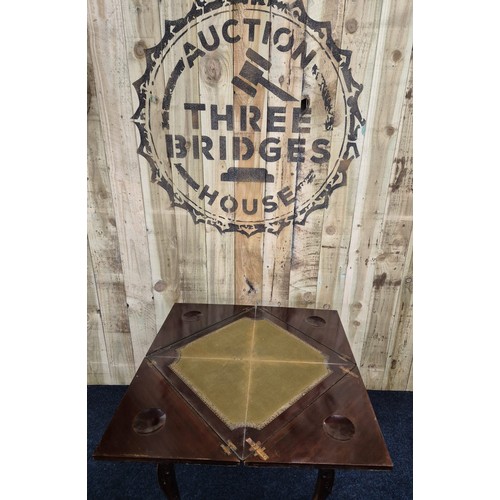 307 - Antique Edwardian mahogany envelope card table, Raised on claw and ball feet. [74x57x57cm- not folde... 