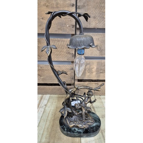 165 - Bronze table lamp sculpture, child on a swing. Raised on a marble base.