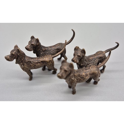 147 - A Pair of Cold painted Bronze dog sculptures. [6cm in length]