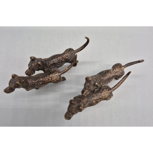 147 - A Pair of Cold painted Bronze dog sculptures. [6cm in length]