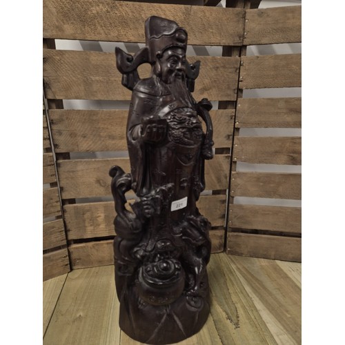 221 - Large and heavy Chinese hardwood carving of an emperor. [59cm high]