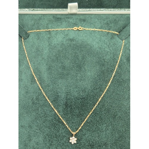 73 - 9ct yellow gold necklace with a 9ct gold and CZ Stone pendant [2.47grams]