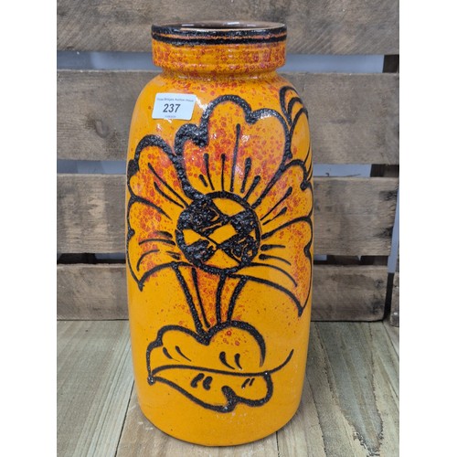 237 - Mid century West German studio pottery Lava glaze floor vase, with floral decoration on an orange gr... 