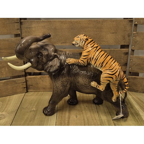 226 - Large Beswick Elephant & Tiger figure. [30cm high]