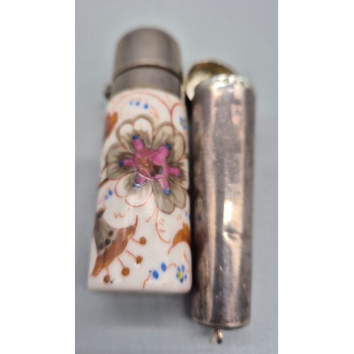 98 - 19th century white metal and white porcelain perfume bottle- depicting floral design. Together with ... 