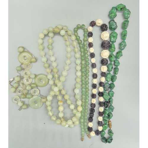 86 - A Lot of various necklaces; Two Chinese Jade necklaces, Green glass necklace,  Malachite necklace an... 