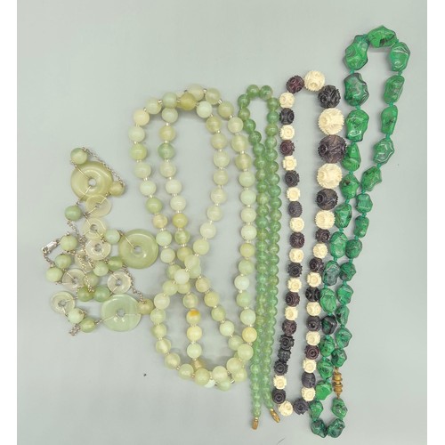 86 - A Lot of various necklaces; Two Chinese Jade necklaces, Green glass necklace,  Malachite necklace an... 