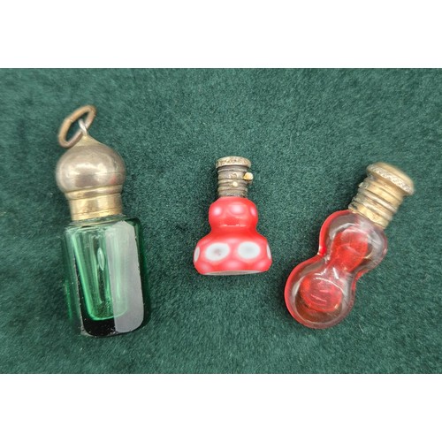 88 - Three antique miniature perfume bottles; Small double over lay pink and white perfume bottle with Fr... 