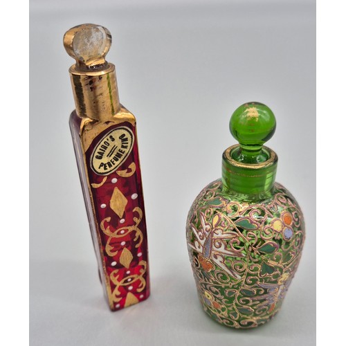 105 - Two antique perfume bottles; Ruby glass and hand painted scent bottle- Gairo's Perfume King and Gree... 