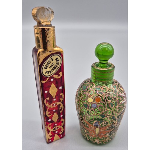 105 - Two antique perfume bottles; Ruby glass and hand painted scent bottle- Gairo's Perfume King and Gree... 