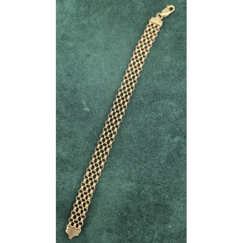 109 - 9ct yellow gold three strand bracelet. [5.53grams] [18cm length]