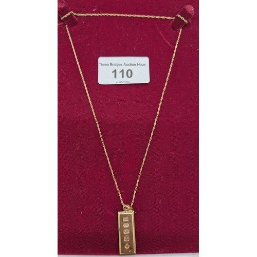 110 - 9ct yellow gold ingot pendant and chain. [5.59grams]