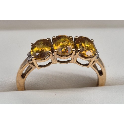 114 - 10ct yellow gold and yellow tourmaline gem stone ring. [Ring size P] [2.51Grams]