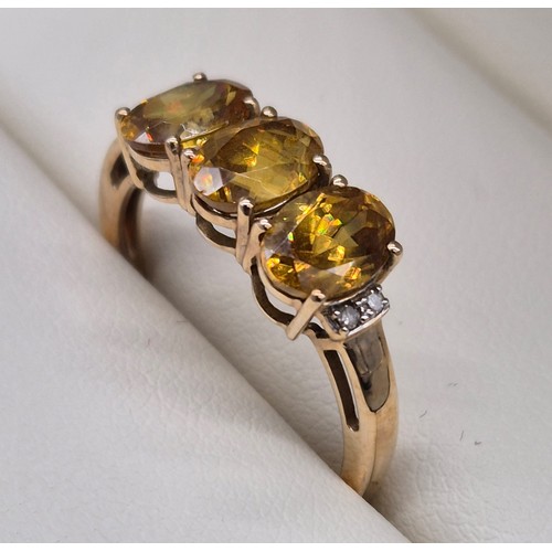 114 - 10ct yellow gold and yellow tourmaline gem stone ring. [Ring size P] [2.51Grams]