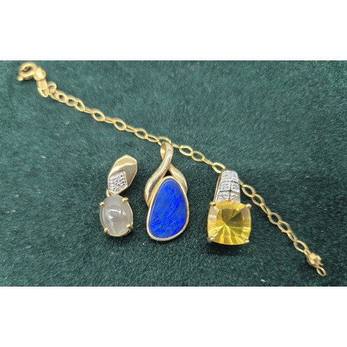 117 - Two 9ct yellow gold and gem stone pendant [Citrine and diamond pendant], together with a 14ct yellow... 