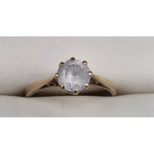 126 - 9ct yellow gold ring set with a large round cut white quartz gem stone. [Ring size Q] [2.51Grams]