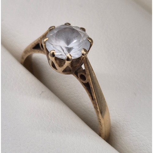 126 - 9ct yellow gold ring set with a large round cut white quartz gem stone. [Ring size Q] [2.51Grams]