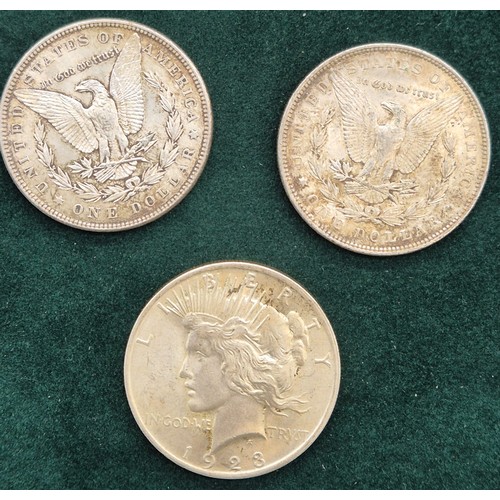 140 - Three American Silver one dollar coins; 1886 Liberty one dollar coin, 1891 Liberty one dollar coin a... 