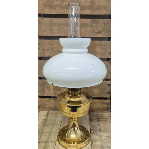 197 - Vintage Brass Aladdin paraffin lamp; Glass funnel, white glass shade and brass body. [59cm high]