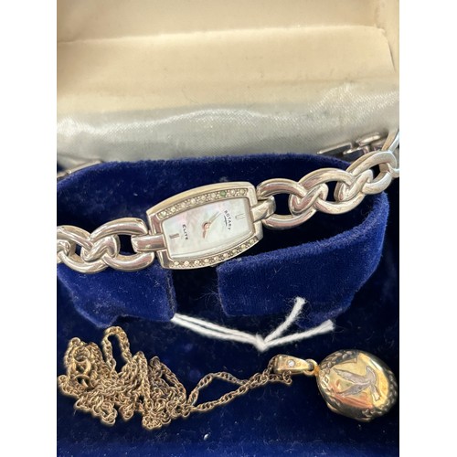 57 - 925 silver gilt locket and matching chain. Together with a Ladies Sterling silver Rotary Elite cockt... 