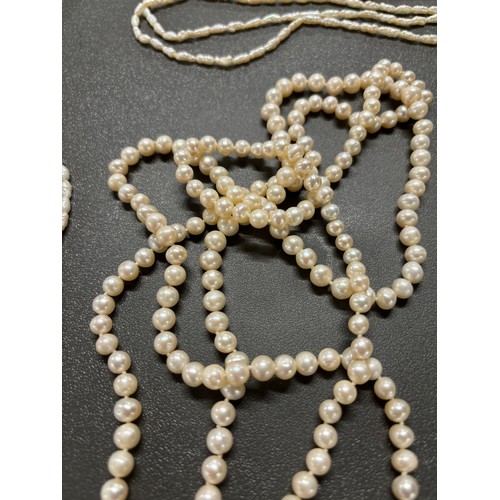 87 - Tray of fresh water pearl necklaces; Ciro 9ct gold clasp and catch and faux pearls necklace, Large s... 