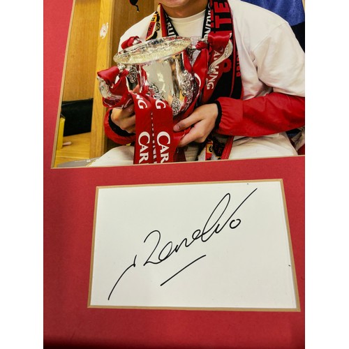 445 - Print of Cristiano Ronaldo with signature and certificate of authenticity, together with a Mancheste... 