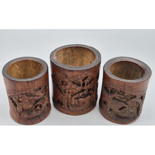 180A - Three antique Chinese bamboo and carved ink pots.