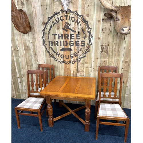 462 - Antique Oak pull out dining table, together with four matching chairs. Square top section with pull ... 