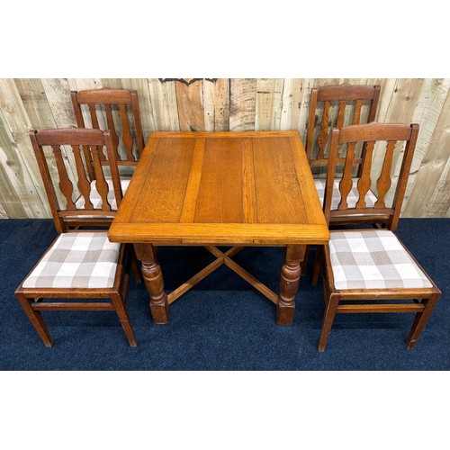 462 - Antique Oak pull out dining table, together with four matching chairs. Square top section with pull ... 