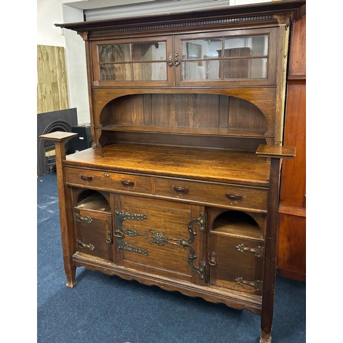 466 - Late 19th century arts and crafts inspired oak dresser. Two door section and shelved area top, Recta... 