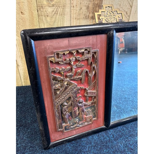 481 - Antique Chinese carved mirror, with carved panels either side of a central mirror. Black lacquered f... 