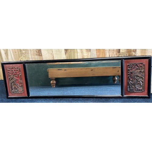 481 - Antique Chinese carved mirror, with carved panels either side of a central mirror. Black lacquered f... 