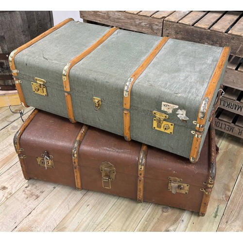 485 - Two vintage steamer trunks; fitted with wooden and metal bounds.