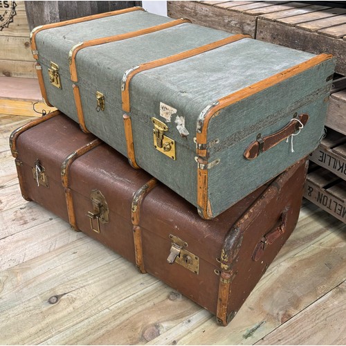 485 - Two vintage steamer trunks; fitted with wooden and metal bounds.