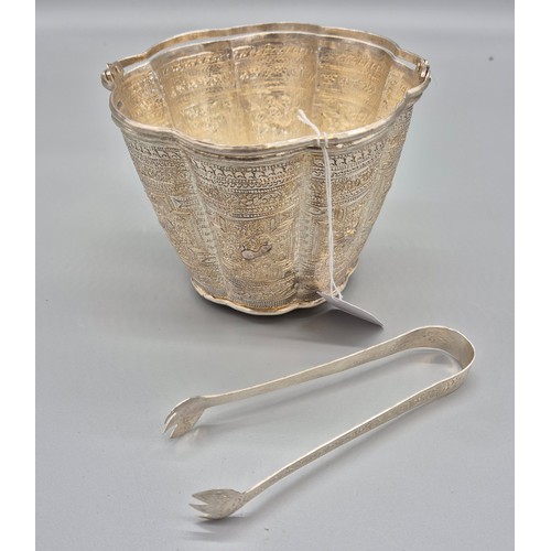 10 - Indian Silver ice bucket with tongs. Has two swing handles attached, raised relief work and scallope... 