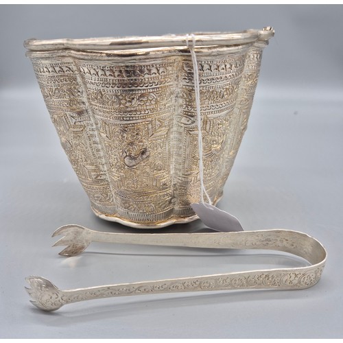 10 - Indian Silver ice bucket with tongs. Has two swing handles attached, raised relief work and scallope... 