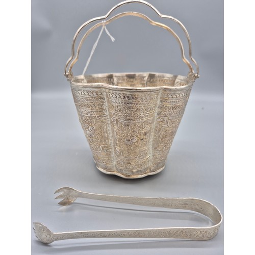 10 - Indian Silver ice bucket with tongs. Has two swing handles attached, raised relief work and scallope... 