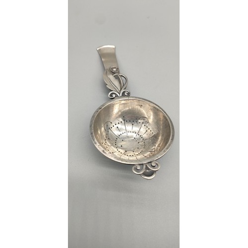 14 - Swedish silver tea strainer. [14.5cm length] [47.64grams]