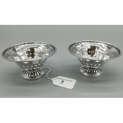 5 - A Pair of Sheffield silver pierced bon bon dishes/ raised bowls. Produced by Walker & Hall. [5.5cm h... 