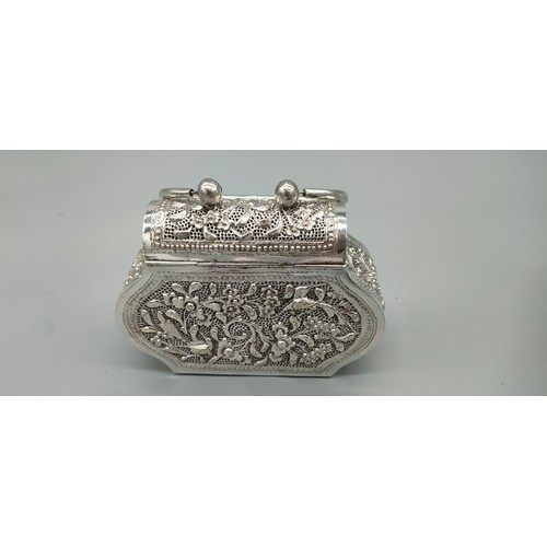 6 - Persian silver plated highly decorated and raised relief clutch bag. [Handle down- 14x18x6cm]