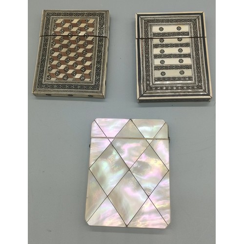 8 - Three various antique card holders; Mother of pearl design and two parquetry designs.