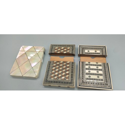 8 - Three various antique card holders; Mother of pearl design and two parquetry designs.