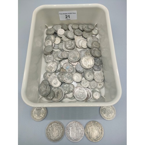 21 - A Collection of silver coinage, half crowns, three pences and six pences. [681grams]