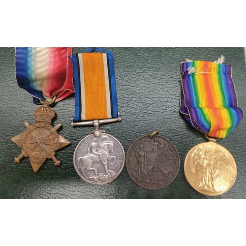 24 - Three WWI Medals and one other. Belonging to 111954 PTE. J. Duncan. R.E. and coronation medallion.