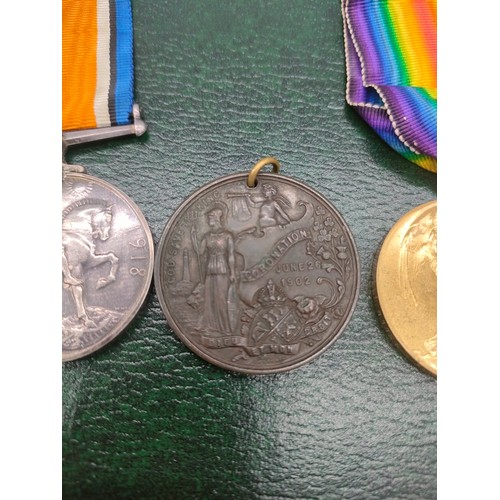 24 - Three WWI Medals and one other. Belonging to 111954 PTE. J. Duncan. R.E. and coronation medallion.