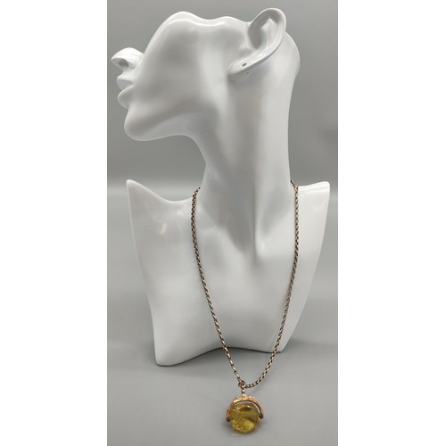 33 - Antique 9ct yellow gold and yellow glass swivel fob pendant and Victorian 9ct gold belcher chain. [H... 